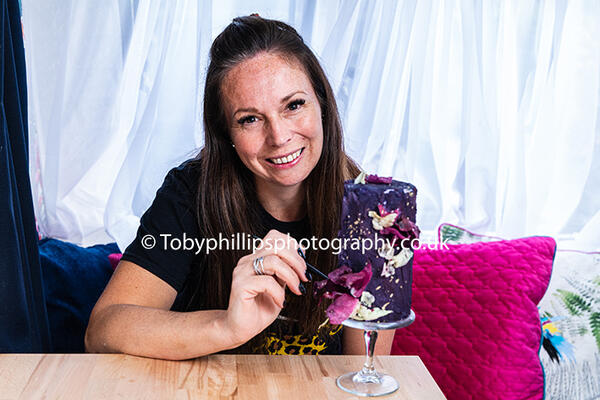 Clare Francis decorates cakes in her adapted caravan (©AAH/Toby Phillips Photography)