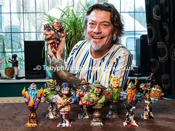 Danny Fuller with his new range of model figures (©Toby Phillips/AAH))