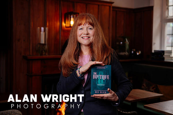 DEE BLICK WITH HER NEW BOOK, THE BOUTIQUE (©AAH/ALAN WRIGHT) DEE BLICK WITH HER NEW BOOK, THE BOUTIQUE (©AAH/ALAN WRIGHT)