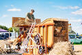 Demonstration of a vintage baling machine (©AAH/Alan Wright) Demonstration of a vintage baling machine (©AAH/Alan Wright)