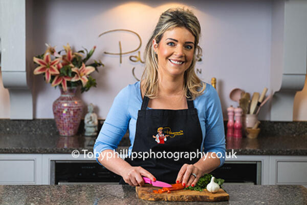Pollyanna at work in her kitchen Pollyanna at work in her kitchen
