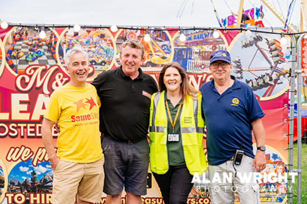 Rotarian Dave Smith with staff from Benson's Funfair and Happy Accidents (©AAH/Alan Wright)