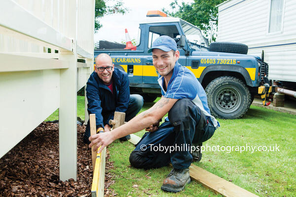 Neil Blanch (back) and Ben Gumbrell fix a balcony