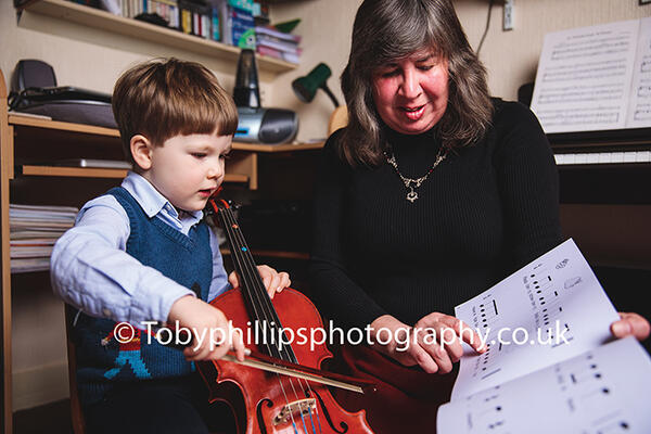 Kay Tucker with a young pupil Kay Tucker with a young pupil
