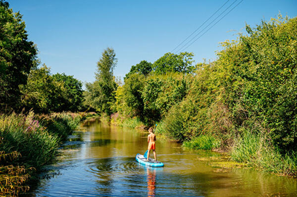 12-year-old Oscar paddleboards north along the canal (©AAH/Alan Wright)